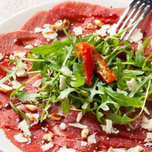 Carpaccio van runds - parmezaan - rucola